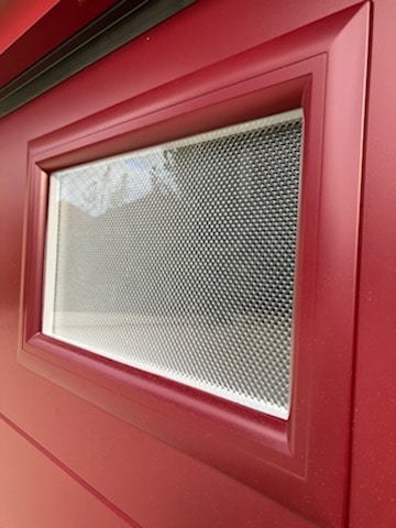 porte de garage sectionnelle rouge avec hublots mpo fenetres alencon